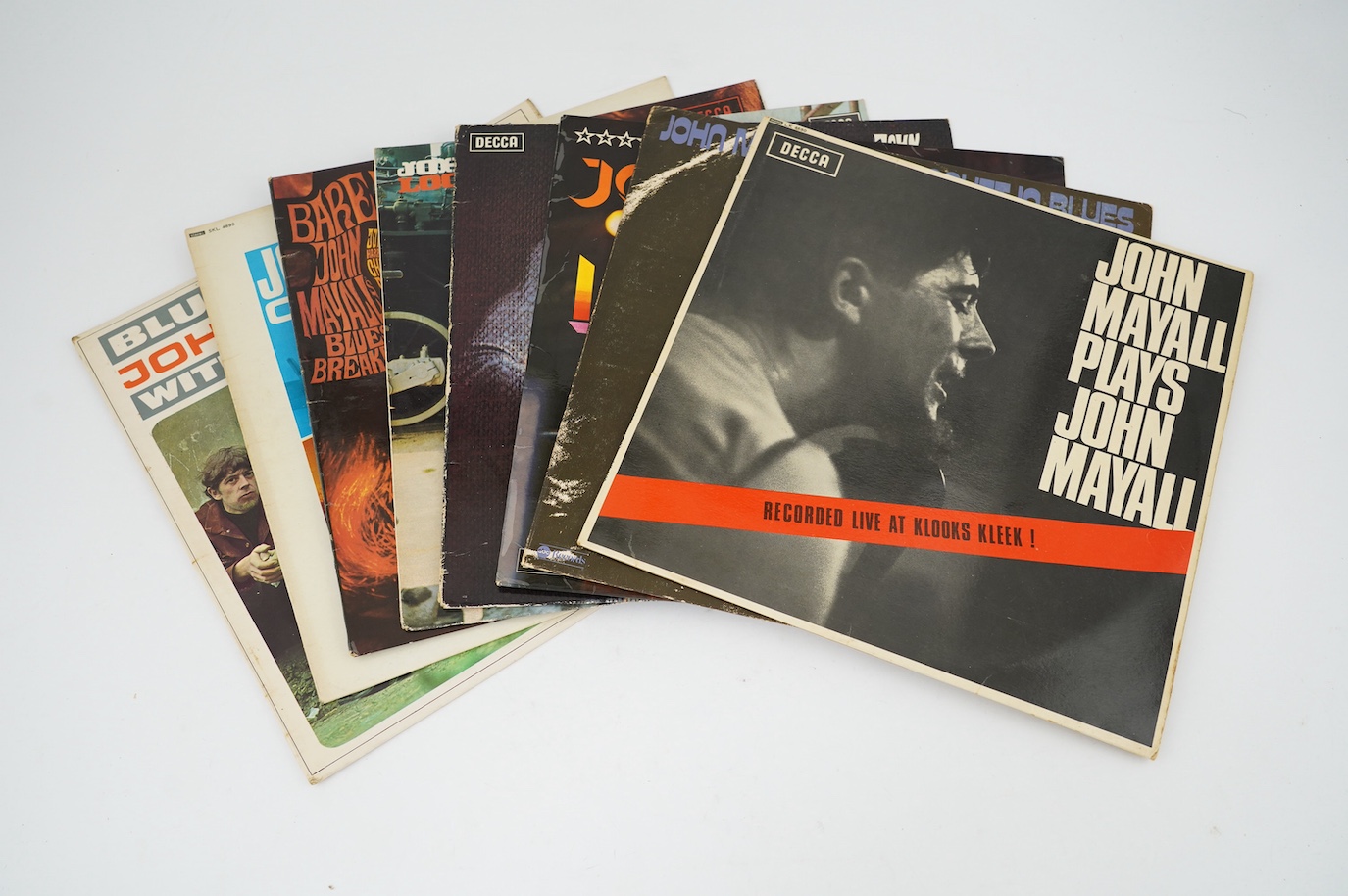 Eight John Mayall LP record albums; John Mayall Plays John Mayall Live at Klooks Kleek on Decca LK.4680, A Banquet in Blues, Live, Thru the Years, Looking Back, Barewires, Crusade, Blues Breakers. Condition - fair